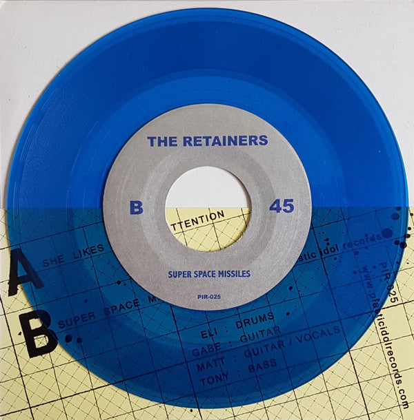 Retainers : She Likes To Get Attention (7", Single, Blu)