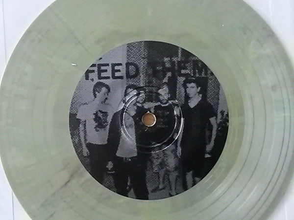 Eating Glass : Feed Them To The Vultures (7", EP, Gre)