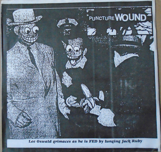 Puncture Wound : Lee Oswald Grimaces As He Is Fed By Lunging Jack Ruby (7")