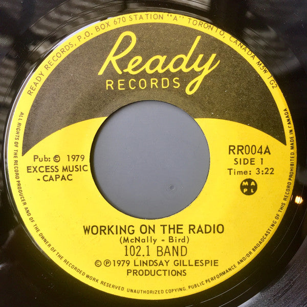 The 102.1 Band : Working On The Radio (7", Single)